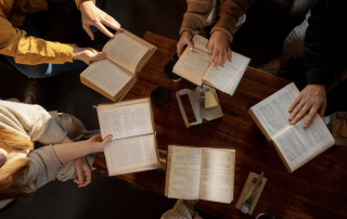 People reading scripture during a Bible Study